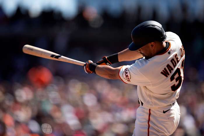 SF Giants first baseman LaMonte Wade Jr. connects with a pitch and sends it into right field. (2022)